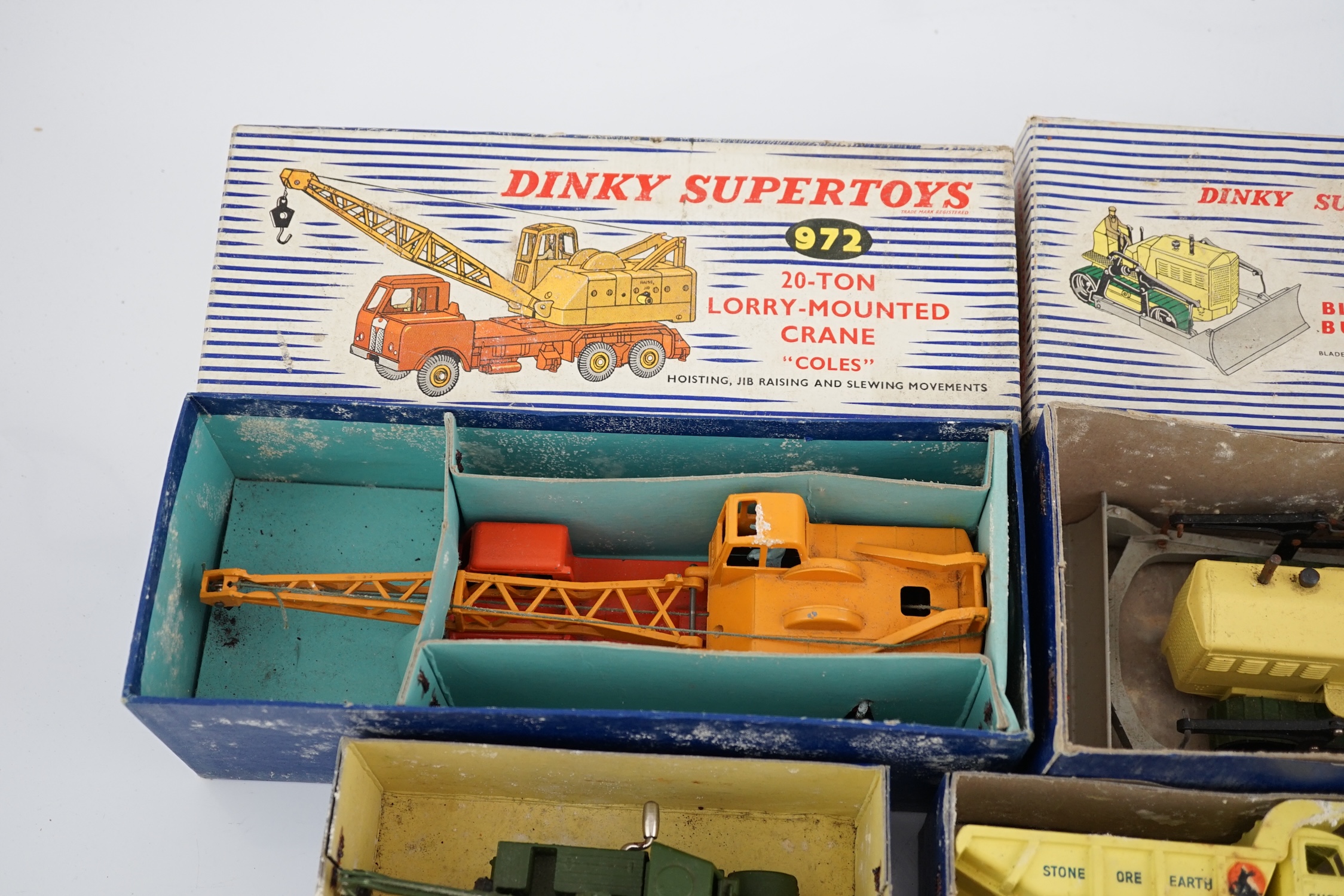 Thirteen Dinky Toys and Supertoys, etc. including; an MGB (113), a Riley Pathfinder, a Triumph Herald, an Armoured Command Vehicle (677), a 20-ton Mounted Crane (972), a Recovery Tractor (661)